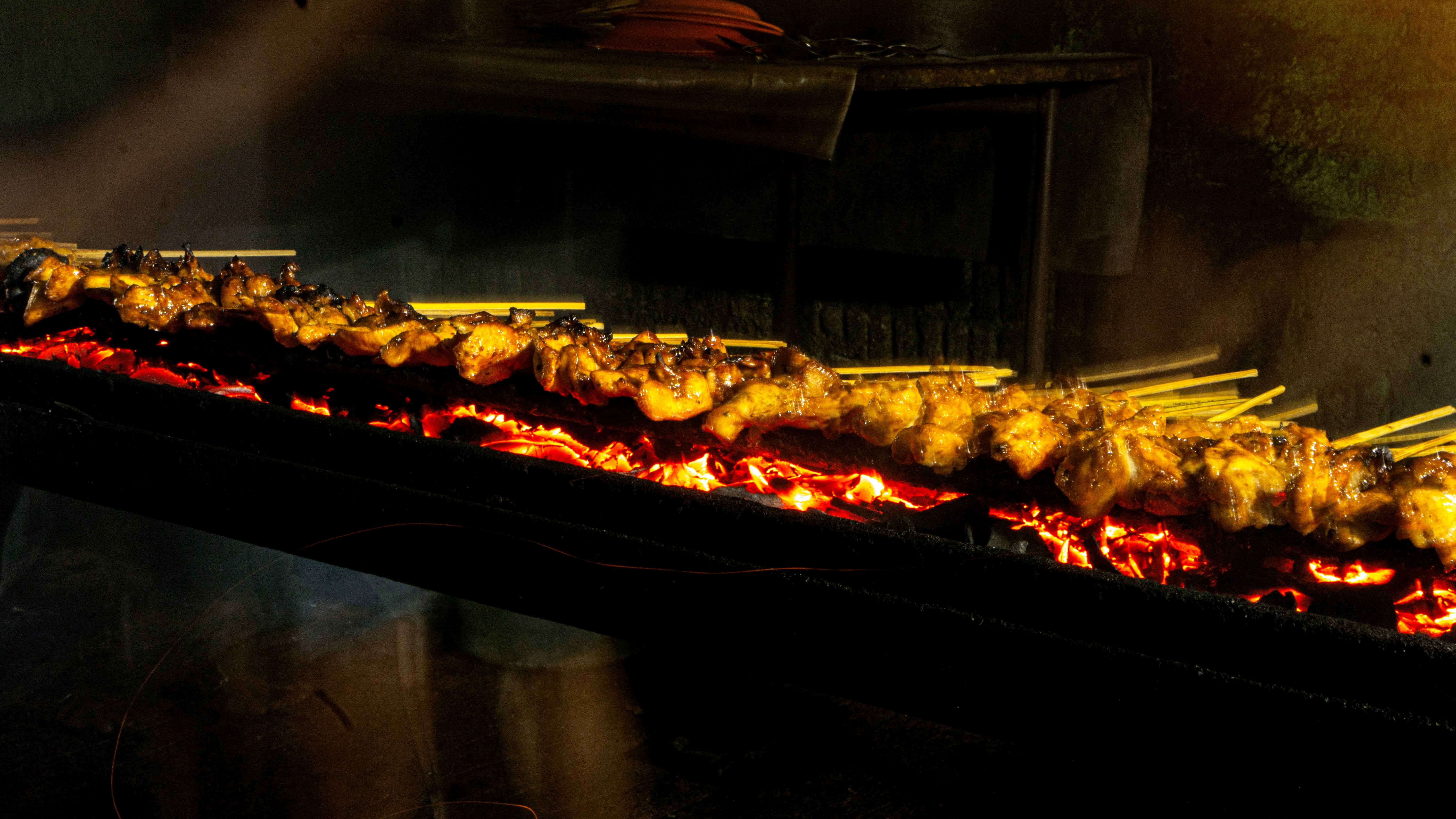 Balkan restaurant with grilled meats, cevapi, warm interior, and authentic dishes