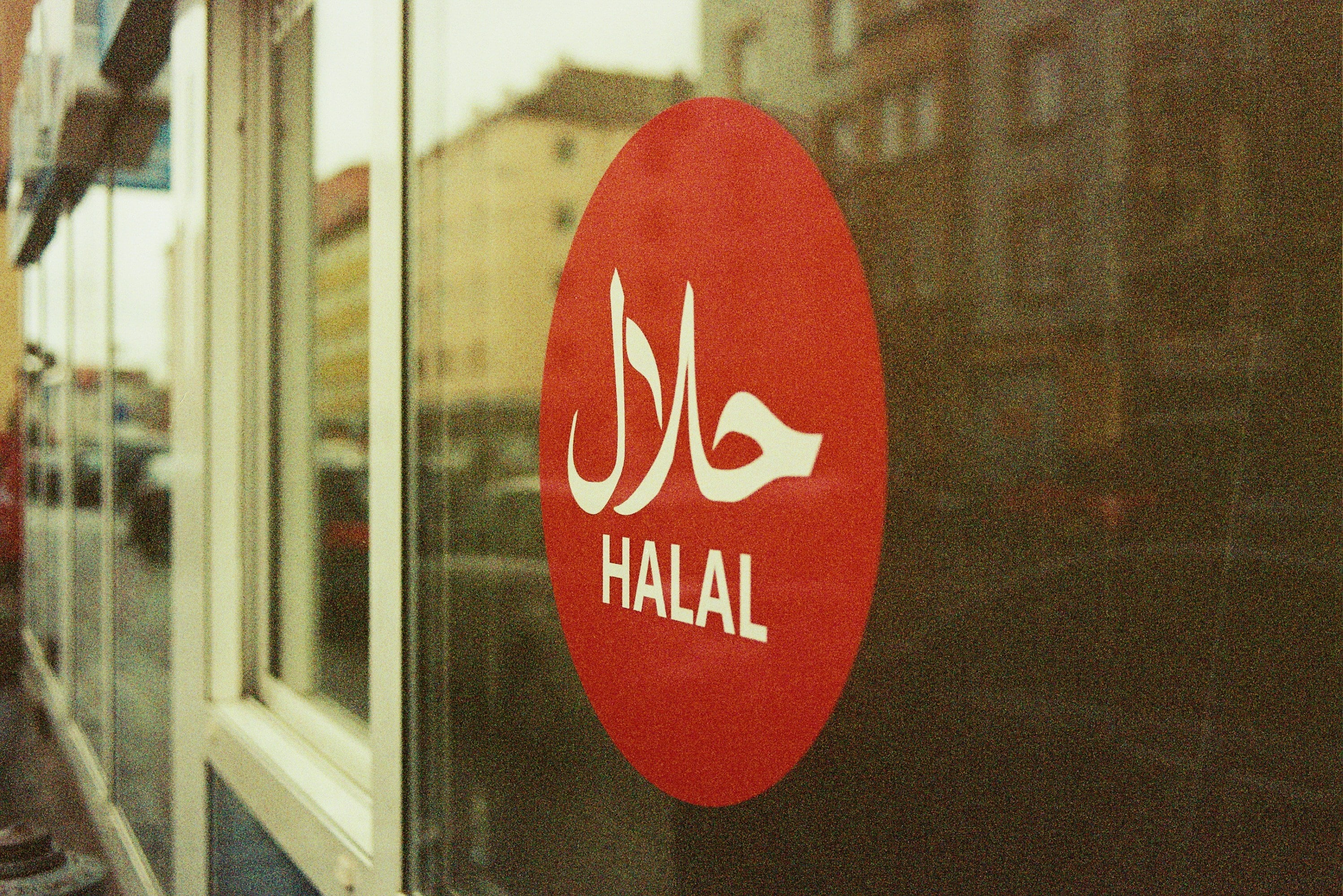 Halal restaurant with Middle Eastern and Pakistani cuisine, warm interior, traditional food display